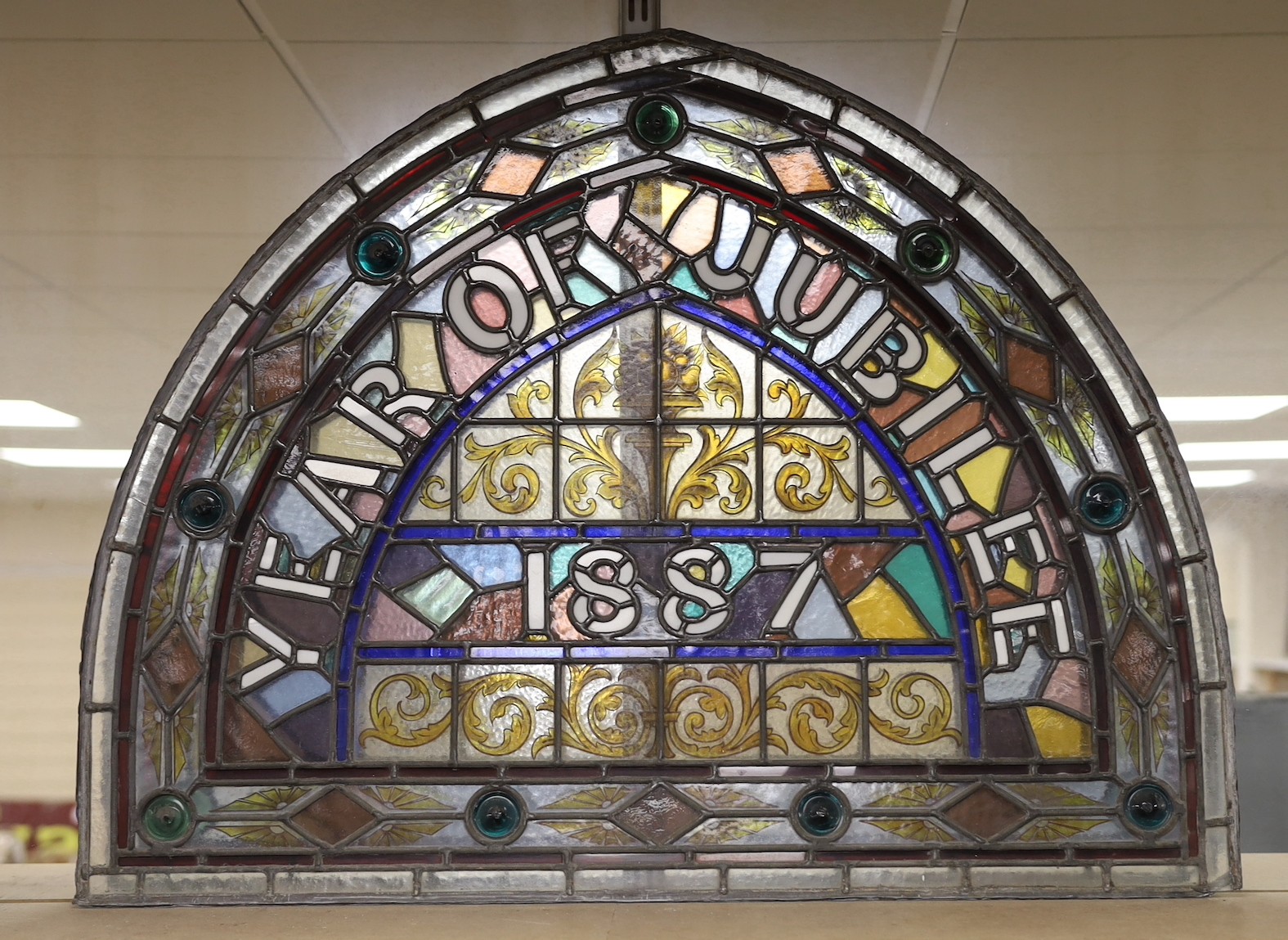 'Year of Jubilee 1887', a Victorian commemorative arched stained glass window, 67x86cm
